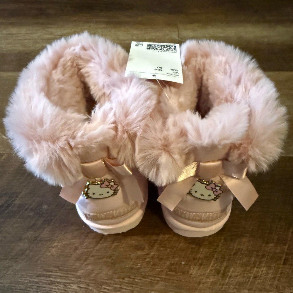 Pink Hello Kitty Furry Boots with Bow and Character Detail